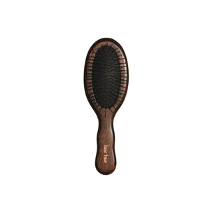 Wooden hairbrush with black bristles from Bur Bur on a white background
