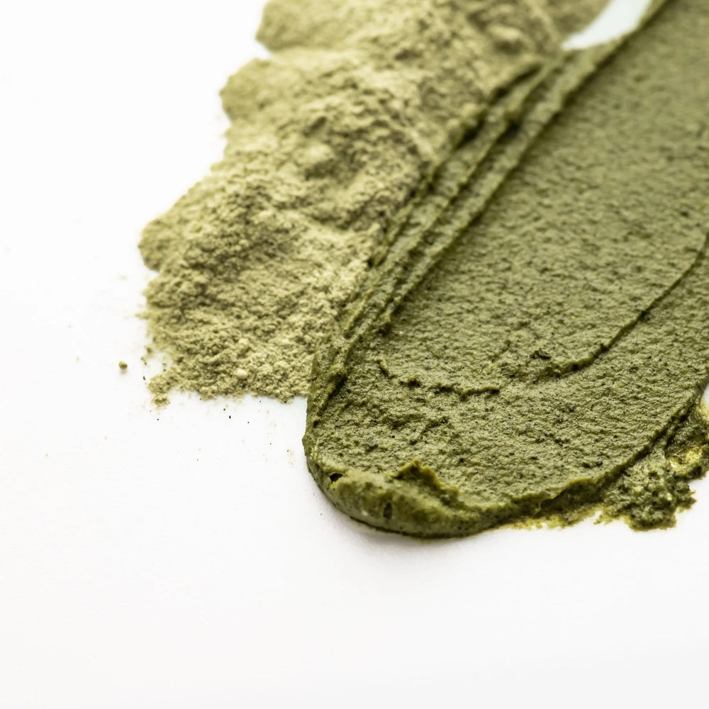 BY ACHILLES Enzyme Cleanser Cleansing Powder in packaging, a gentle enzymatic foaming cleanser with French green clay, willow bark, and neem extract. Suitable for exfoliation and deep cleansing.