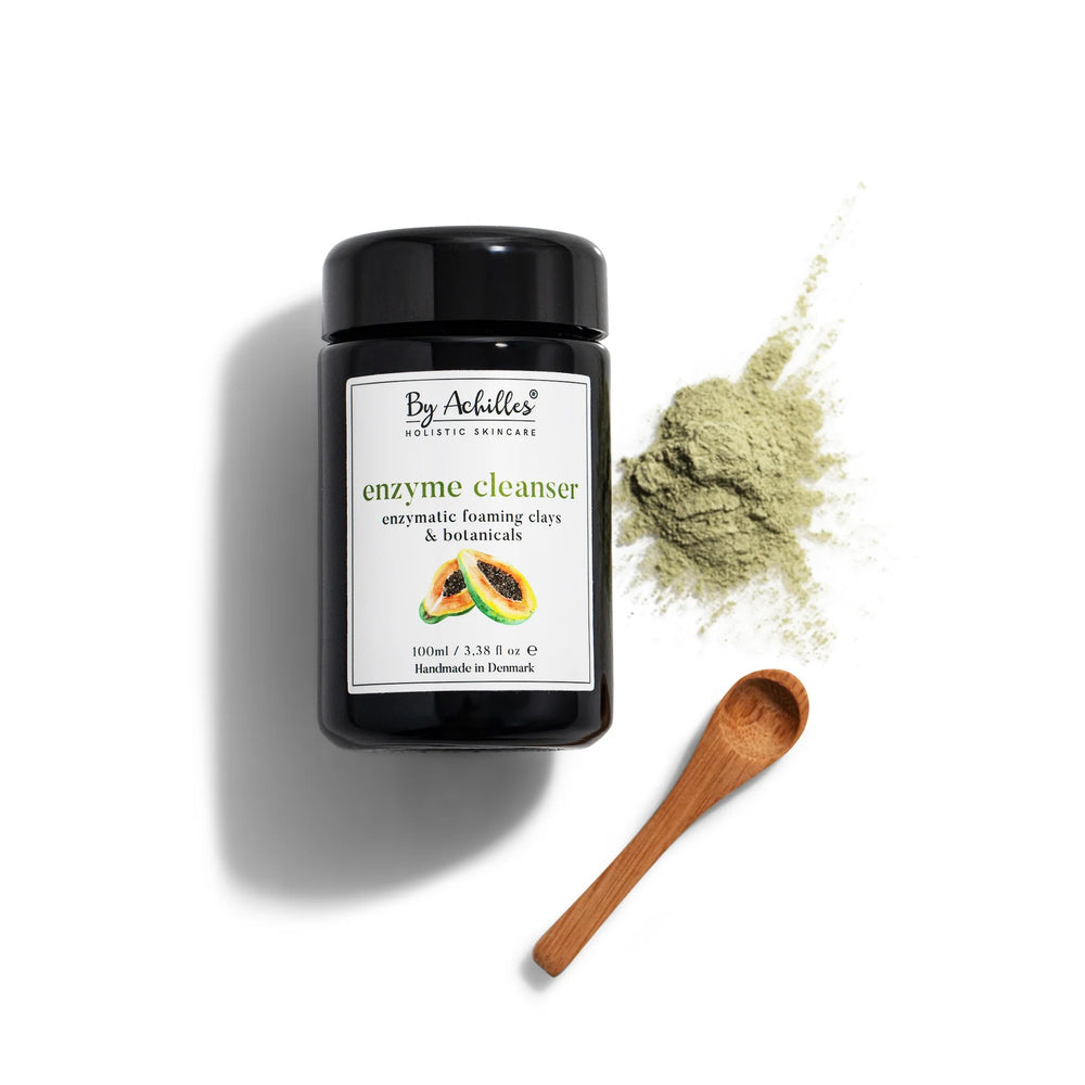 BY ACHILLES Enzyme Cleanser Cleansing Powder in packaging, a gentle enzymatic foaming cleanser with French green clay, willow bark, and neem extract. Suitable for exfoliation and deep cleansing.