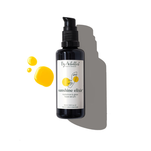 By Achilles Sunshine Elixir Facial Serum - luxurious, quick-absorbing oil-based serum with CO₂ extracted ingredients for glowing, hydrated skin.
