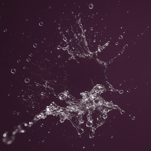 Water splashes against a dark background