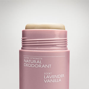 Pink deodorant stick with 'Extra Strength Natural Deodorant' and 'Lavender Vanilla' scent on a light gray background