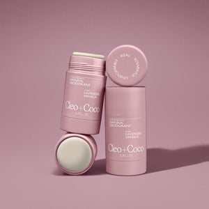 Cleo + Coco deodorant sticks on a pink background
