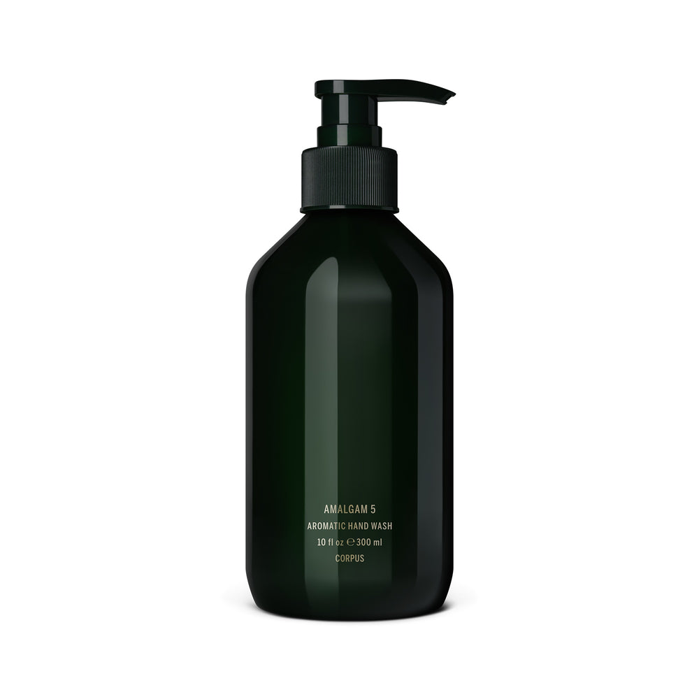 CORPUS Aromatic Hand Wash Amalgam 5 in a sleek recycled plastic bottle with FSC-certified packaging, scented with lemon, bergamot, vetiver, cypress, and cedar.