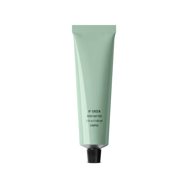 CORPUS Body Butter Nº Green Mini in a recyclable aluminum tube with FSC-certified packaging, enriched with citrus and spice notes of bergamot, pink lemon, orange blossom, and cardamom.