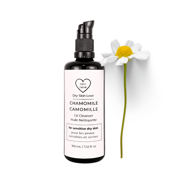 Dry Skin Love Chamomile Oil Cleanser for dry sensitive skin, featuring organic blue chamomile CO2 extract and plant oils. In black glass bottle with white label and black pump