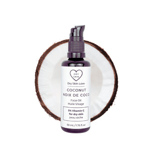 Dry Skin Love Coconut 5% Vitamin C Face Oil for sensitive skin in a 50ml black glass bottle with white label and black pump, featuring organic coconut oil, apple seed oil, and chamomile extract.