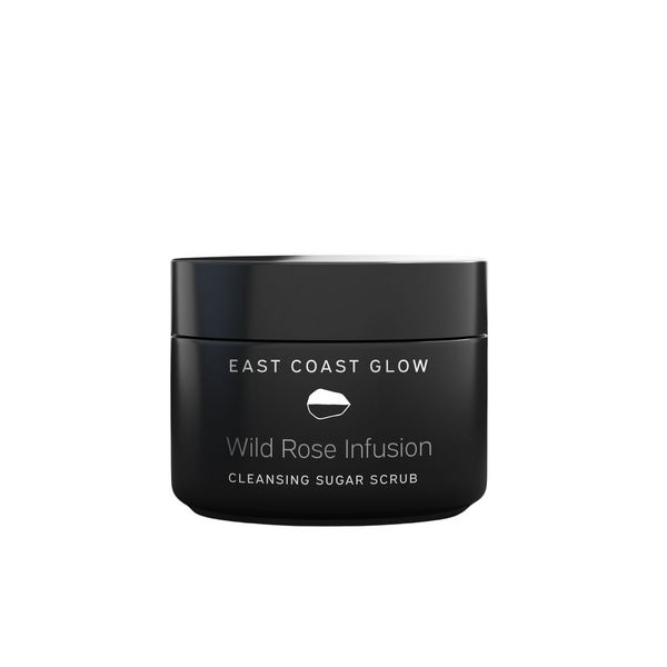 East Coast Glow Wild Rose Infusion Cleansing Sugar Scrub – 250g jar with gentle floral scent and a creamy texture that rinses away clean.