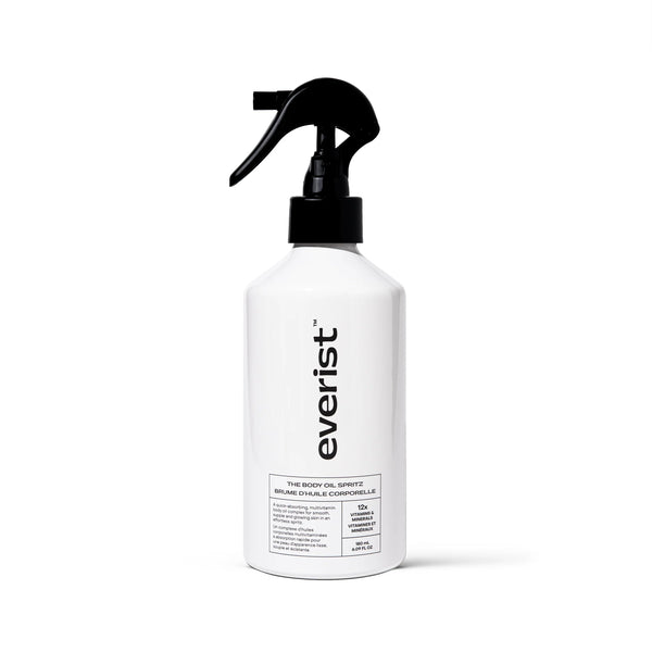 EVERIST The Body Oil Spritz in white aluminium bottle with black pump on white background