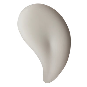 A texture shot of FREE + TRUE Marigold Morning AM Creamy Gel Cleanser on white background