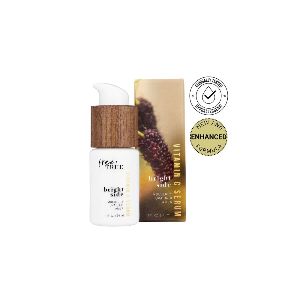 FREE TRUE Bright Side Vitamin C Serum in white glass packaging with a white and bamboo pump, on white background