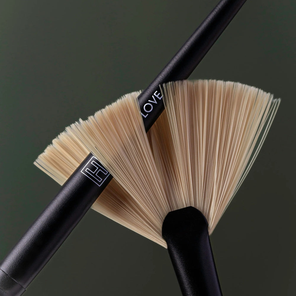 H Is For Love H Masking Brush with matte black handle and fan-shaped bristles for perfect mask application. Cruelty-free and designed for precise use.