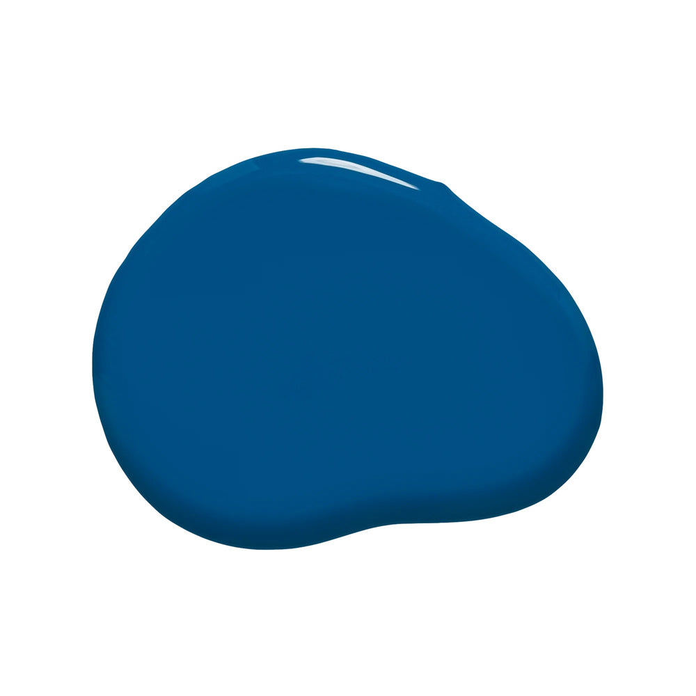 Huella Echoes of Blue nail lacquer in a deep azure shade, featuring a 15-free, vegan, and chip-resistant formula.