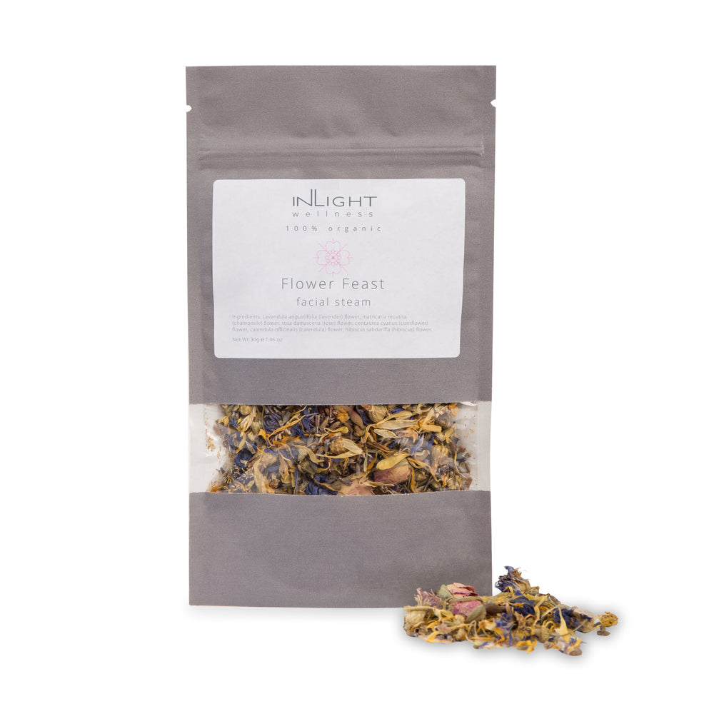Inlight Beauty Flower Feast Facial Steam, an organic blend of lavender, chamomile, rose, calendula, hibiscus, and cornflower, designed to hydrate and refresh skin.
