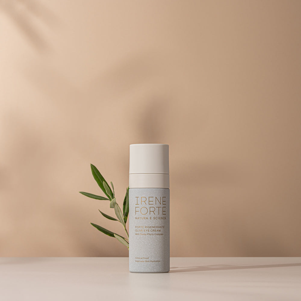 Irene Forte olive eye cream with packaging on a white background. IRENE FORTE SKINCARE Olive Eye Cream – a fast-absorbing eye cream with Penta-Phyto Complex in a sleek 30ml bottle, suitable for sensitive eyes.