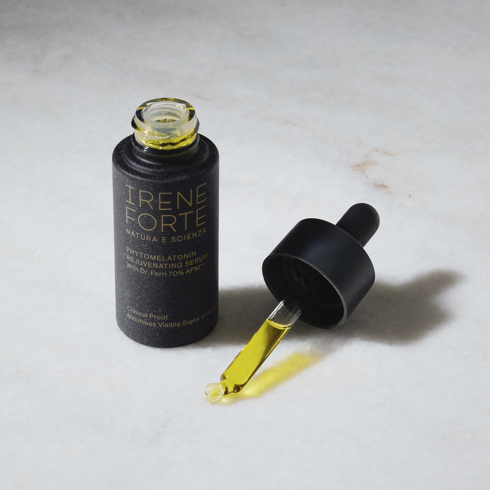 Irene Forte Skincare Phytomelatonin Rejuvenating Serum bottle with Dr. Ferri 70% APM™ and 30% Vitamin E for smoother, more refined-looking skin.