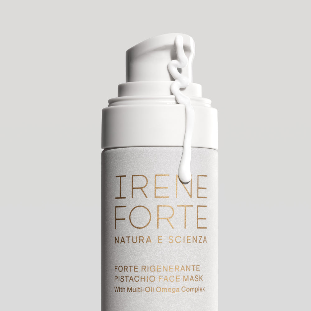 Irene Forte Skincare Pistachio Face Mask bottle with natural ingredients like pistachio nuts and green leaves on a white background.