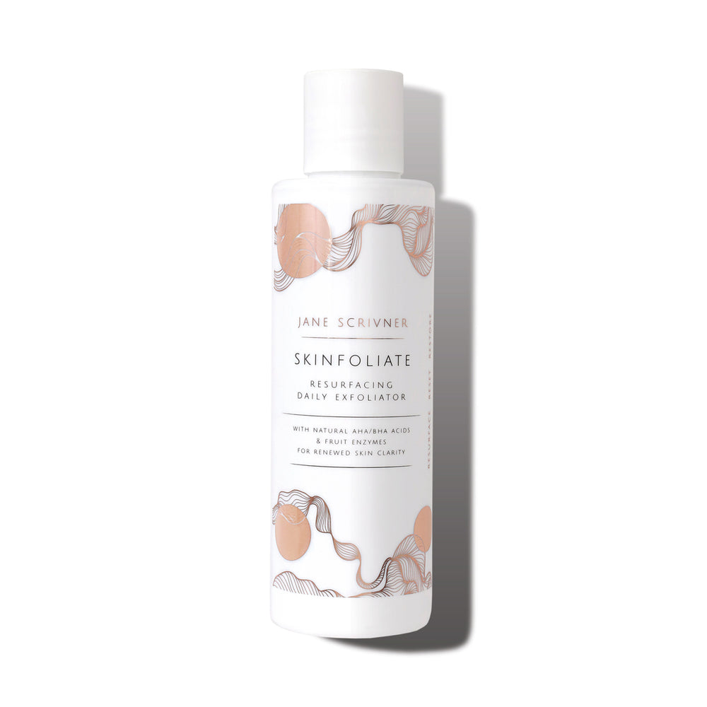 A white bottle of Jane Scrivner Skinfoliate Resurfacing Daily Exfoliator with peach and gray botanical illustrations on the label, set against a plain white background with a soft shadow.