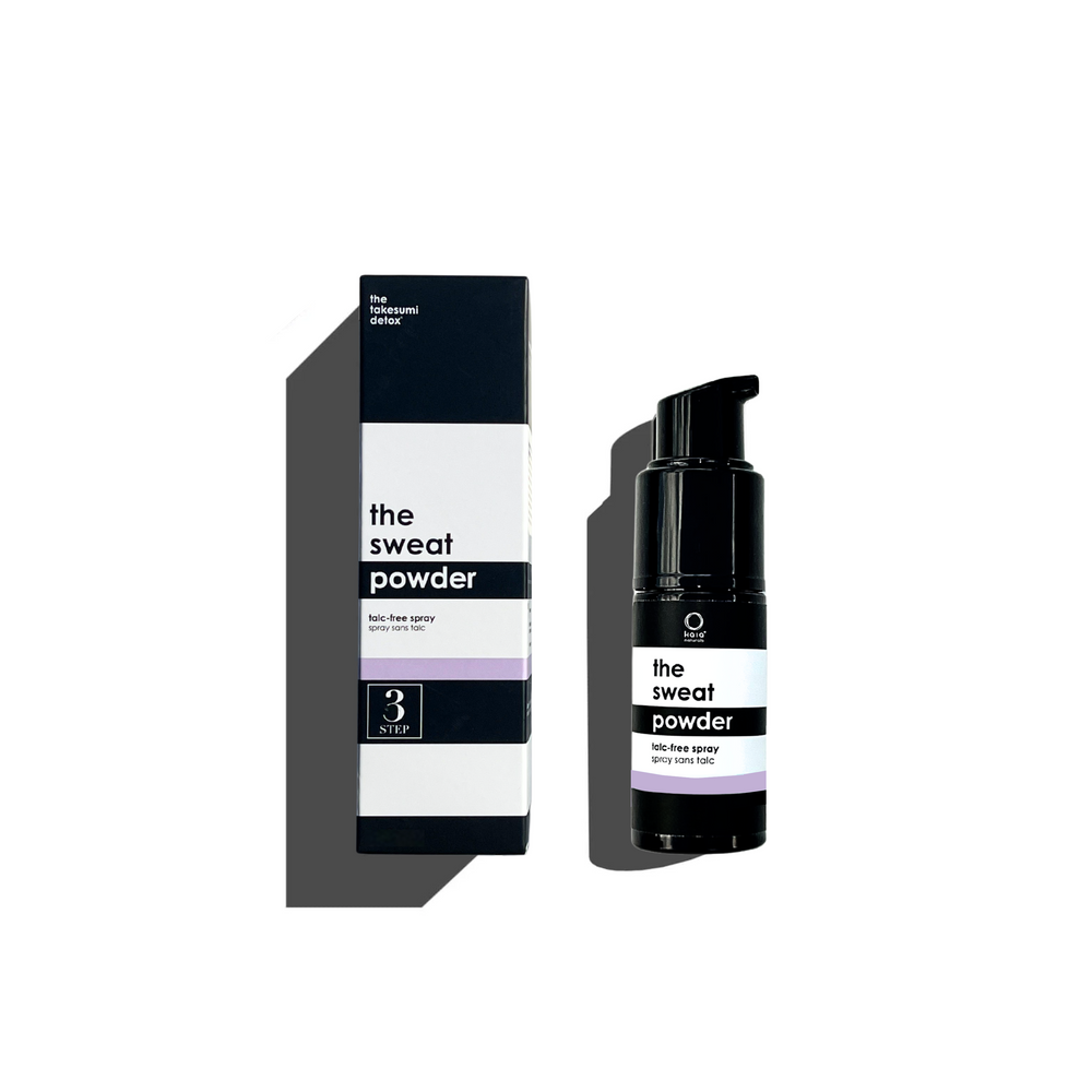 Kaia Naturals The Sweat Powder Sakura Blossom spray bottle, ideal for freshening sweaty skin naturally with a floral rose and jasmine scent.