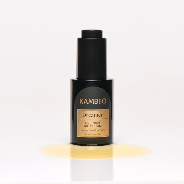 Kambiio Dreamer Refining Oil Serum – Baobab, Black Cumin, and Willow Bark serum in a biophotonic glass bottle, designed to refine and hydrate skin.