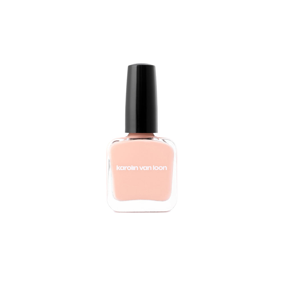 Karolin Van Loon 02 Grès Corail – vibrant coral pink nail polish with peachy undertones in a sleek glass bottle, vegan and 12-free, made in Belgium.