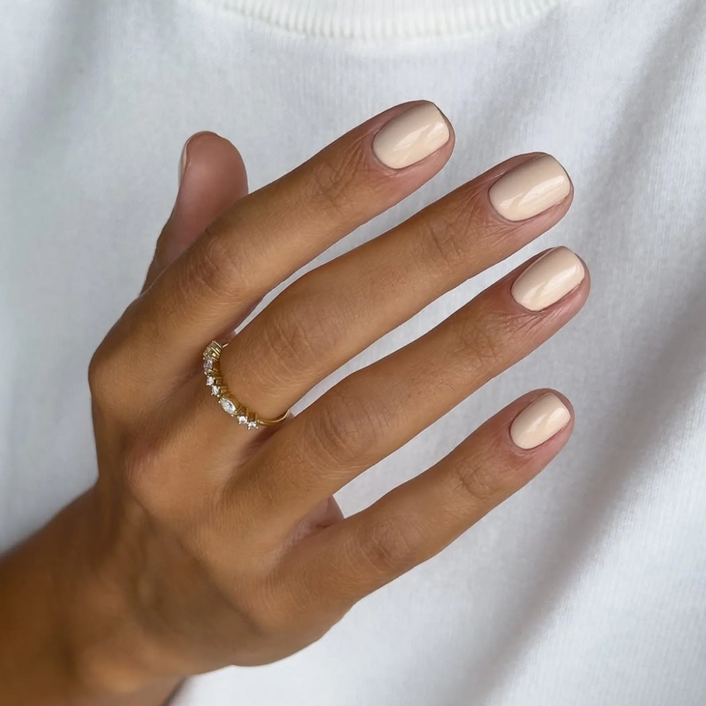 Karolin Van Loon 14 Jardin De Lys – neutral beige nail polish inspired by lilies, vegan, cruelty-free, 12-free, eco-friendly formula with long-lasting glossy finish.