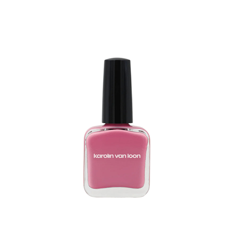 Pink nail polish bottle with black cap on a white background