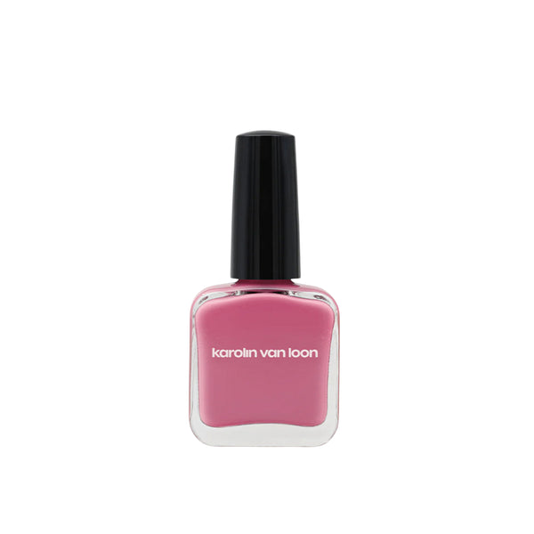 Pink nail polish bottle with black cap on a white background
