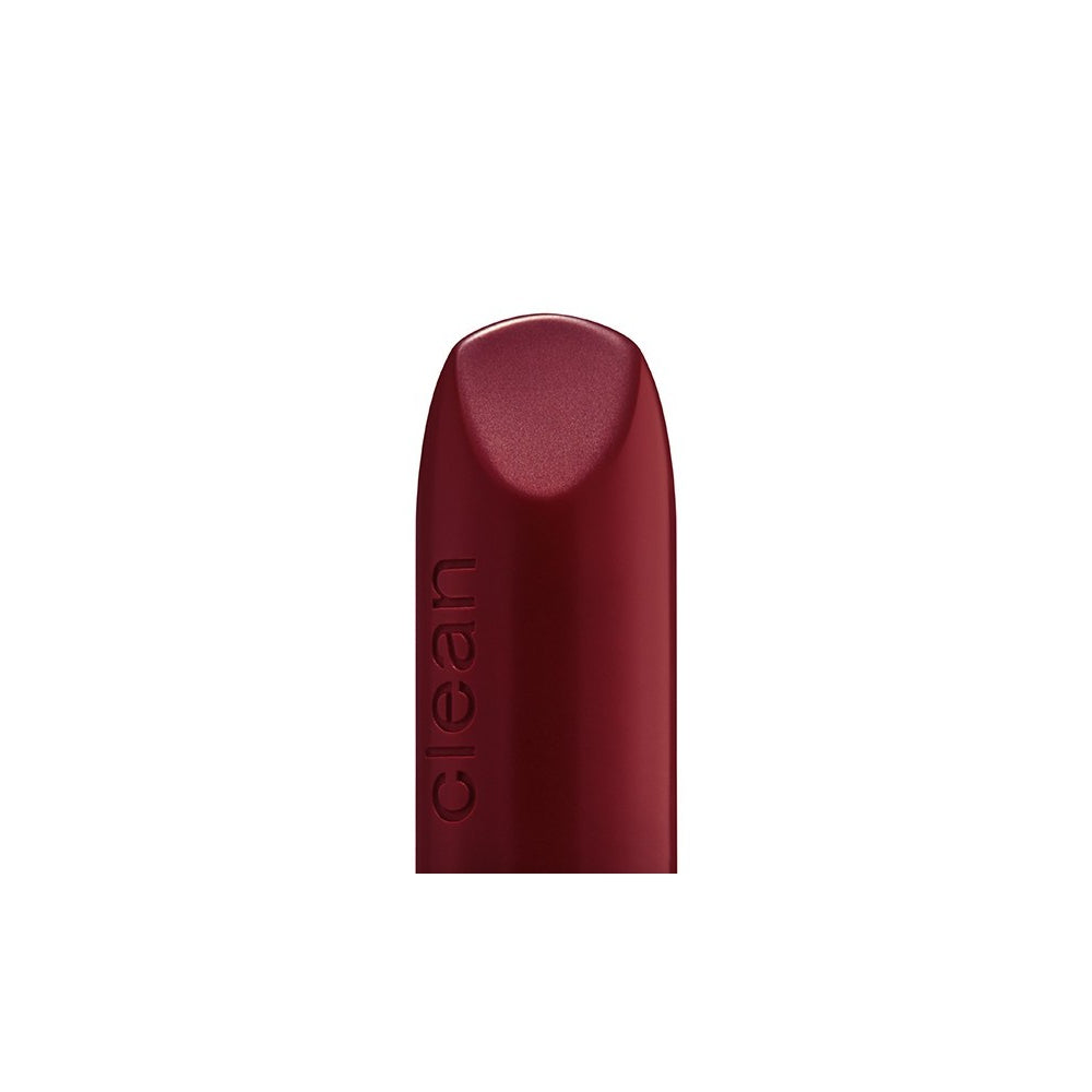Kure Bazaar Amore Lip Balm in a chic light denim case, offering vibrant rosy-red color and eco-friendly, refillable design.