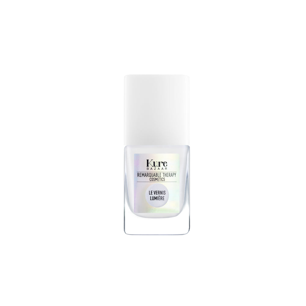 Nail polish bottle Le Vernis Lumière Illuminateur Blanc with 'Kure Bazaar' branding on a white background