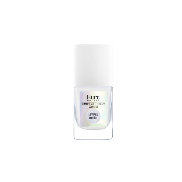 Nail polish bottle Le Vernis Lumière Illuminateur Blanc with 'Kure Bazaar' branding on a white background