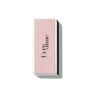 Kure Bazaar Pink Buffing Block nail accessory with multiple sides for polishing and a white side for high-shine finish.