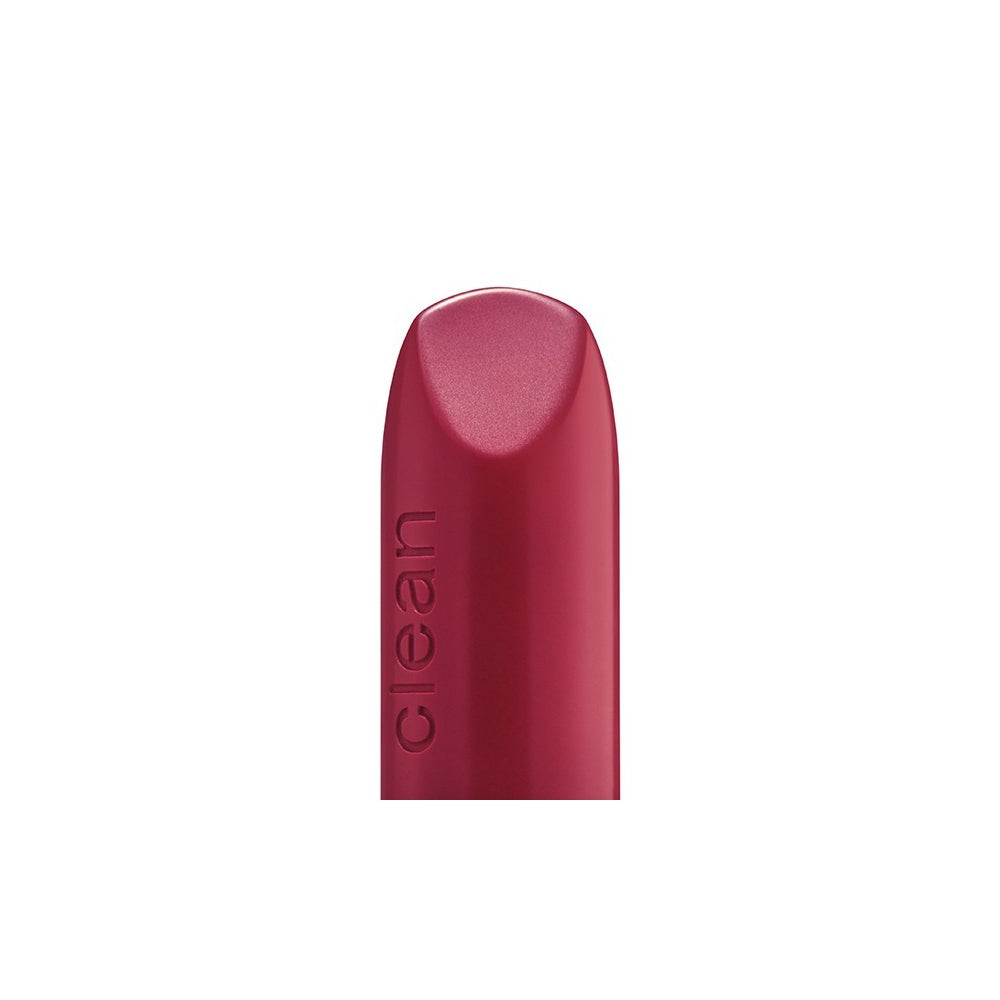 Kure Bazaar Rose Punk Lip Balm in a light denim case, featuring a bold yet translucent rose tint with a sustainable, refillable design.