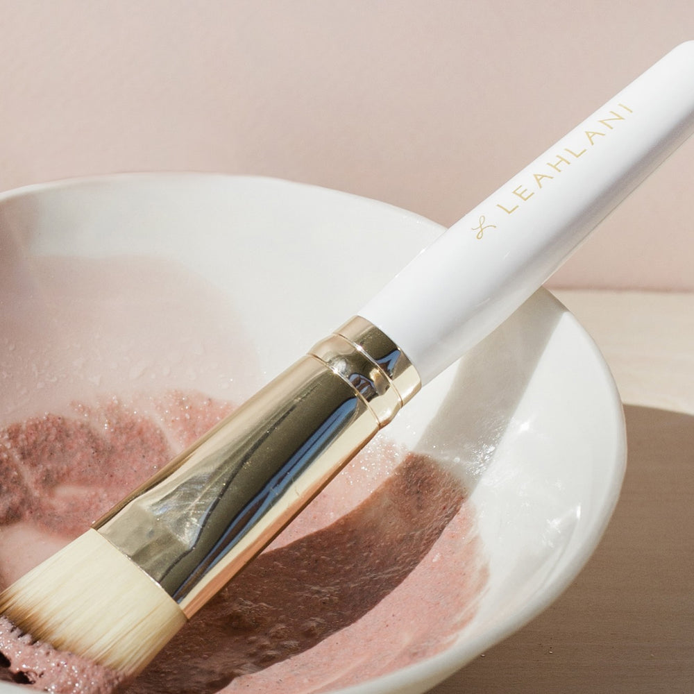Leahlani Skincare Mask Brush, a vegan eco-friendly wooden brush designed for smooth, effortless mask application and a luxurious skincare ritual.