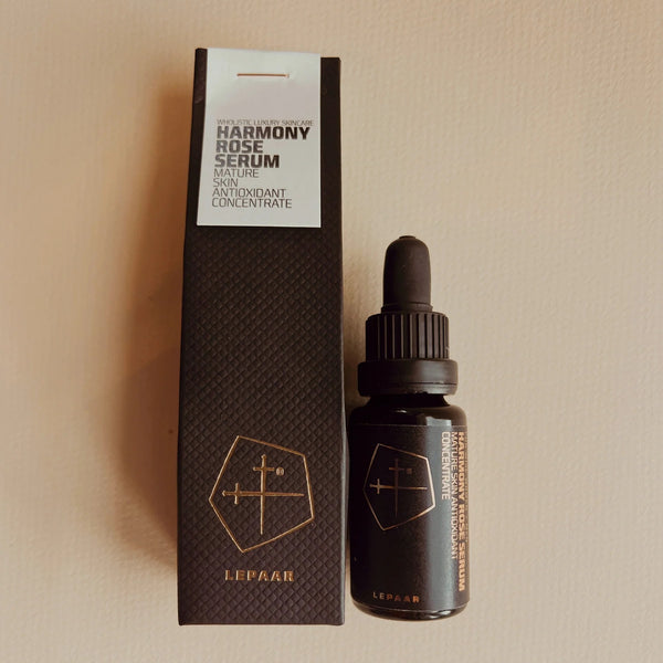 Harmony Rose Serum bottle and packaging on a beige background. LEPAAR Harmony Rose Serum / Face + Neck Oil