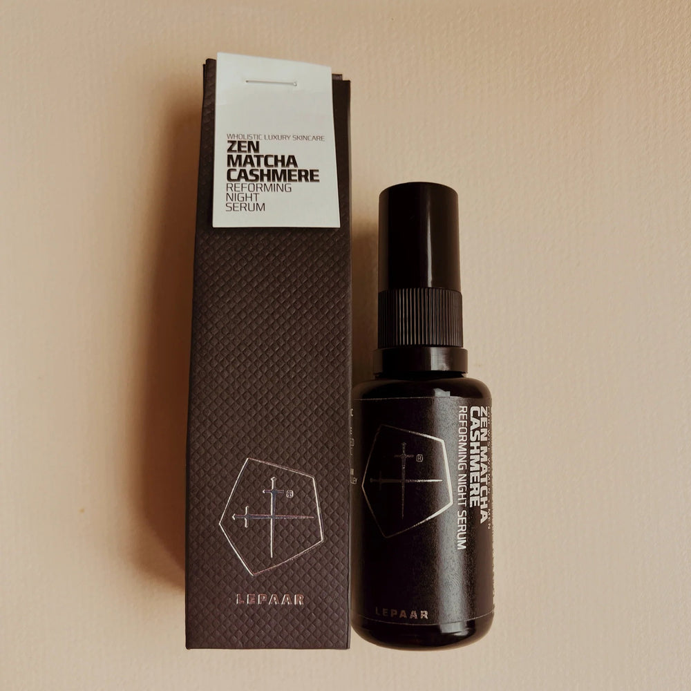 Black spray bottle with a brand logo on a white background. LEPAAR Zen Matcha Cashmere / Reforming Night Serum
