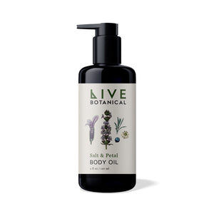 Bottle of Live Botanical Salt & Petal Body Oil on a white background