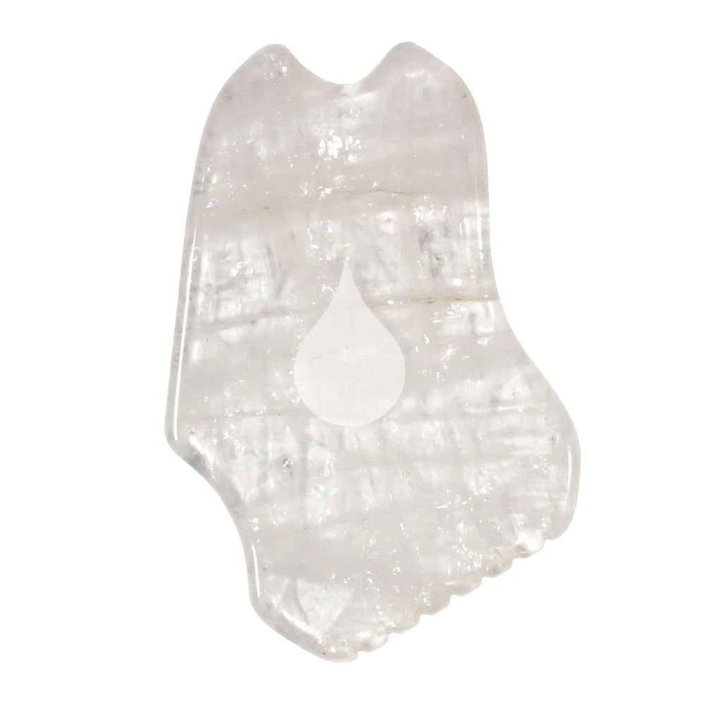 Living Libations Classic Quartz Gua Sha stone with gentle curves for facial and body massage.