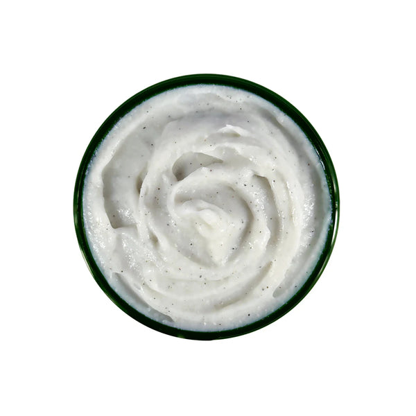 An open jar of LIVING LIBATIONS Peppermint Exfoliating Scrub