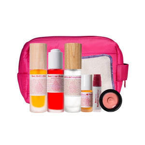 Living Libations Revelry of Roses Beauty Kit with rose-infused skincare and pink puffer bag
