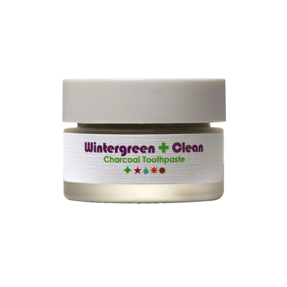 Living Libations Wintergreen Clean Charcoal Toothpaste, a natural toothpaste with wintergreen and charcoal, promoting a fresh, bright smile. 30ml