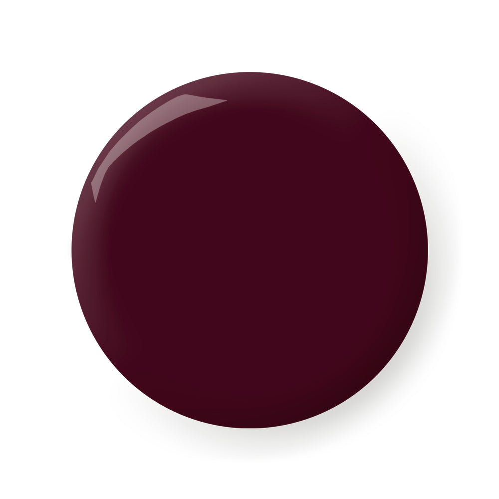 Deep purple nail polish bottle — London Grace Felix.