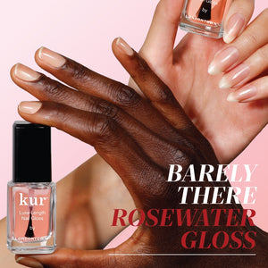Two hands with painted nails holding a bottle of LONDONTOWN Luxe Length Nail Gloss