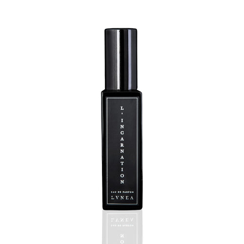LVNEA L'Incarnation Eau De Parfum – Black glass bottle with spray top, showcasing a luxurious floral fragrance blend of carnations, musk, and honeysuckle, presented in a sleek 30 ml size. 30ml