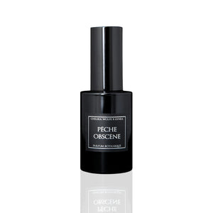 Amethyst glass bottle of LVNEA Pêche Obscène Eau de Parfum, featuring notes of peach, jasmine, and patchouli, encased in a matte black tube.