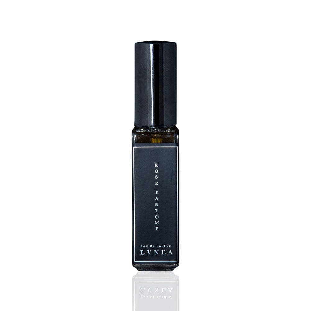 LVNEA Rose Fantôme Eau De Parfum: 30ml black glass bottle with atomizer, showcasing a sophisticated fragrance blend of rose, immortelle, and earthy notes inspired by Paris's Cimetière du Père Lachaise.