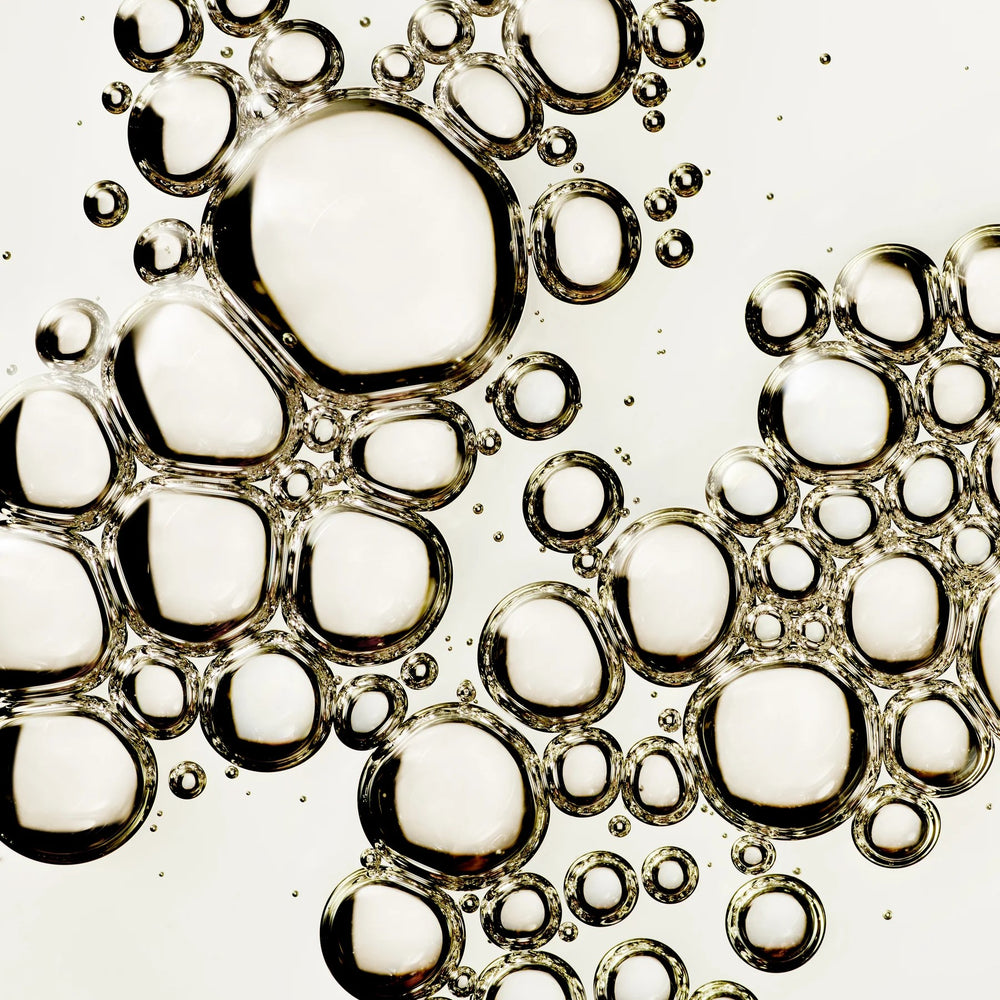 Bottle of Manasi 7 Botanical Body Oil Aoki, a luxurious plant-based body oil for nourishing and hydrating the skin.