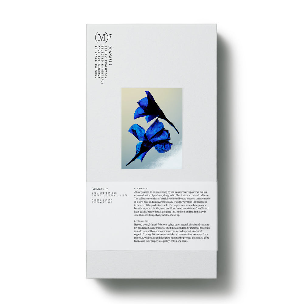 Manasi 7 Limited Edition Discovery Set featuring four travel-size skincare jars from the Microbioskin™ collection in a sleek presentation box.