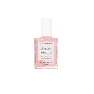 Bottle of MANUCURIST Active Plump baby pink polish with a pearly, semi-opaque finish.