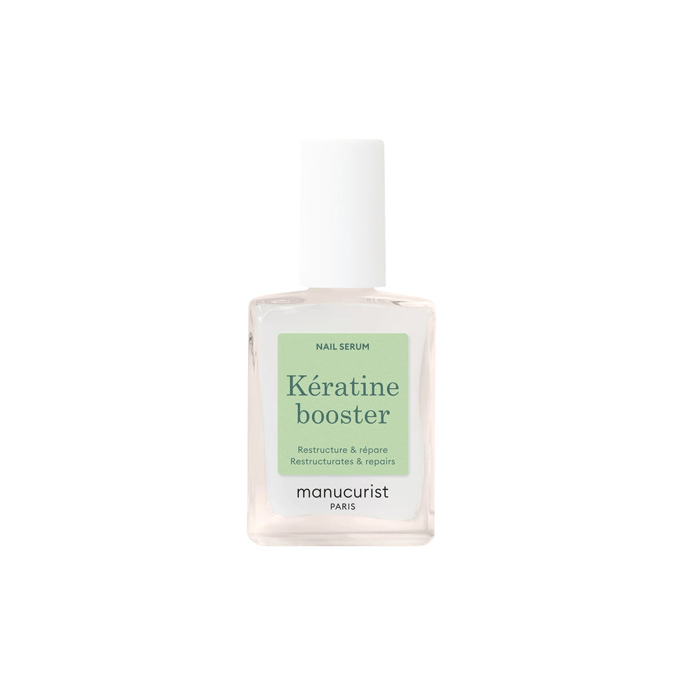 Close-up of MANUCURIST Kératine Booster Nail Strengthening Serum bottle, a keratin-rich polish designed to harden, repair, and fortify soft nails.